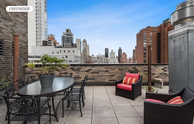 balcony featuring a view of city