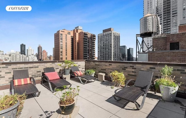 view of patio with a view of city