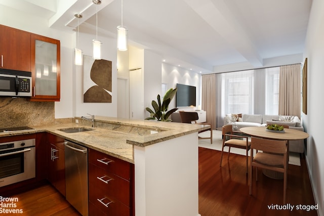 kitchen with kitchen peninsula, light stone countertops, sink, appliances with stainless steel finishes, and beamed ceiling