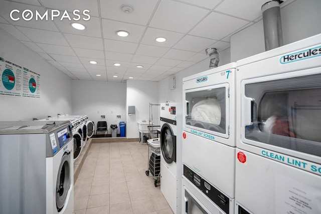 common laundry area with stacked washer and dryer, recessed lighting, and washer and clothes dryer