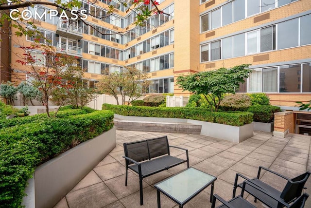 view of home's community featuring a patio area