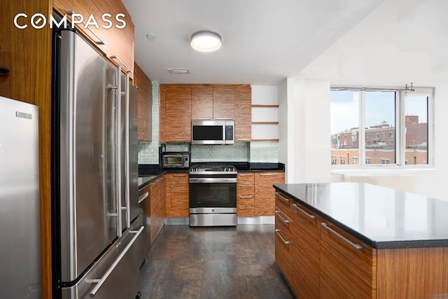 kitchen featuring tasteful backsplash and stainless steel appliances