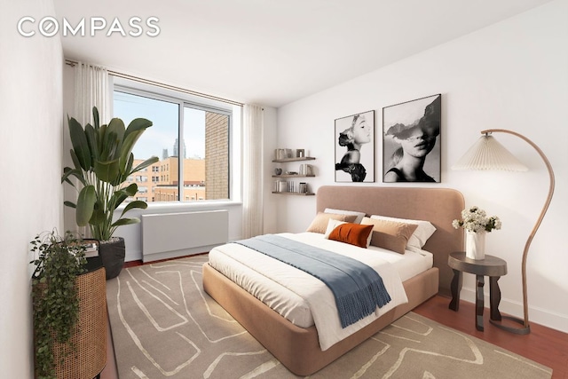 bedroom featuring hardwood / wood-style floors