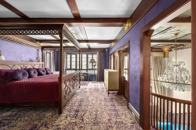 bedroom with a chandelier and beam ceiling