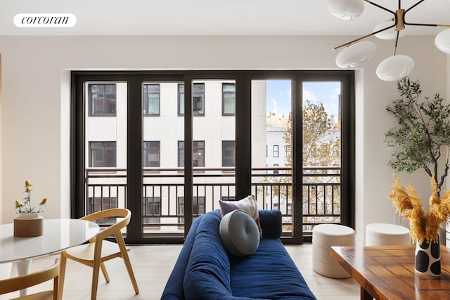 living room with visible vents and light wood-style floors