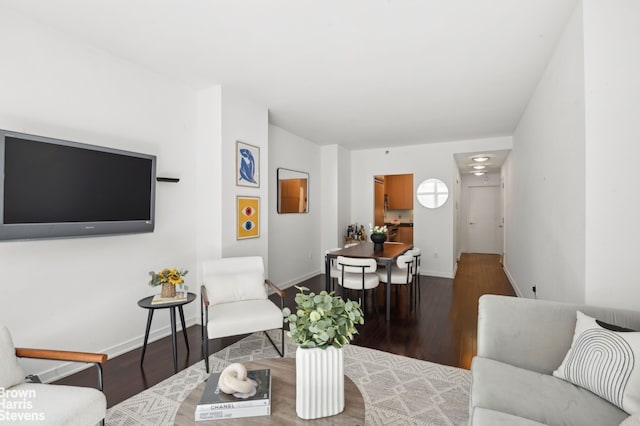 207 E 57th St Unit 4Ab, New York City, NY 10022 - living area featuring wood finished floors and baseboards