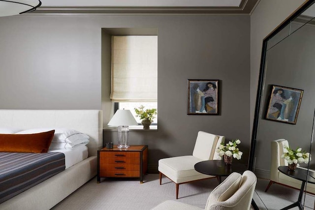 carpeted bedroom featuring ornamental molding