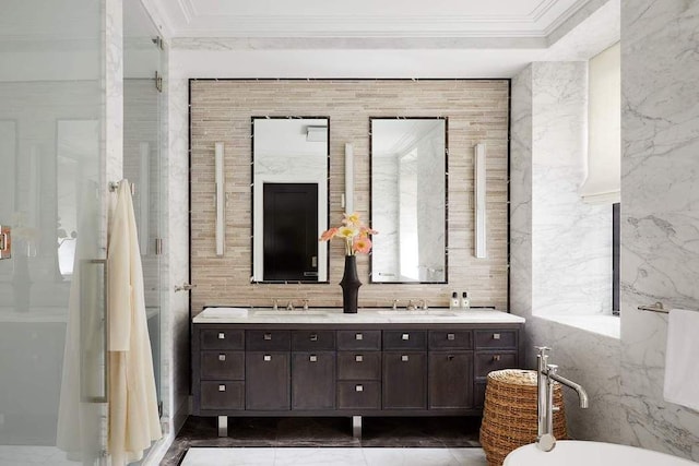 bathroom featuring ornamental molding and vanity