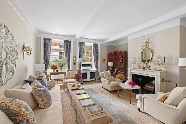 sitting room featuring beamed ceiling, a fireplace, and ornamental molding