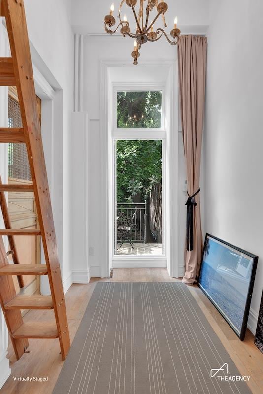 1388 Lexington Ave Unit 2W, New York City, NY 10128 - foyer with a chandelier and stairs