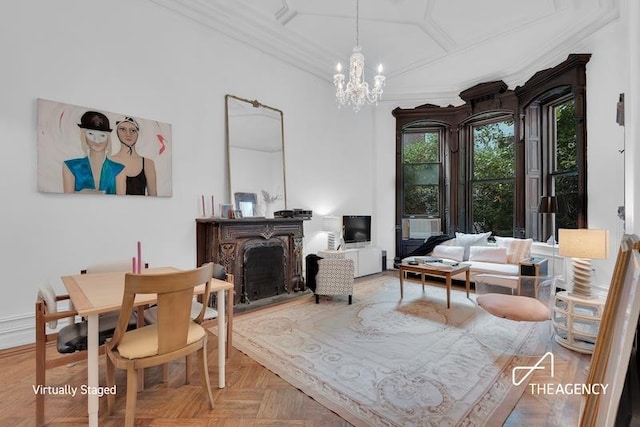 living room with crown molding, parquet floors, and a chandelier