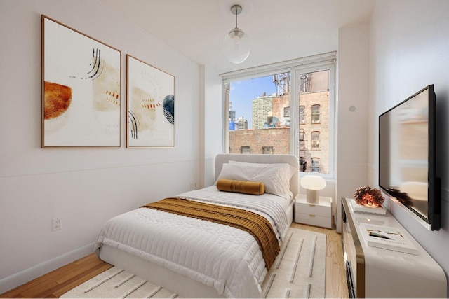 bedroom featuring light hardwood / wood-style floors