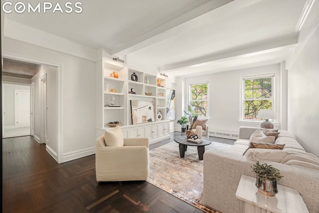 living area with dark parquet floors and a baseboard heating unit