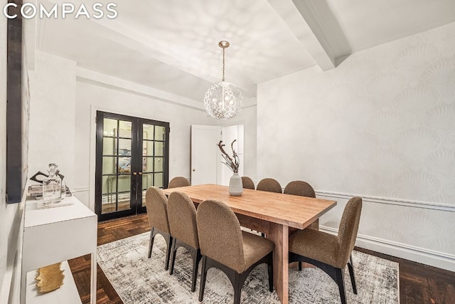 dining area with parquet flooring, beamed ceiling, french doors, and a notable chandelier