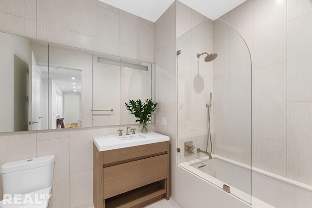 full bath featuring toilet, shower / washtub combination, and vanity