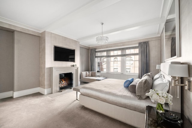 carpeted bedroom featuring baseboards, an inviting chandelier, crown molding, beamed ceiling, and a fireplace with flush hearth