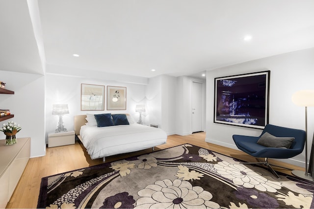 123 Prince St Unit 1, New York City, NY 10012 - bedroom with wood finished floors, recessed lighting, and baseboards