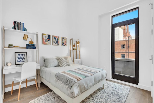 bedroom featuring hardwood / wood-style floors