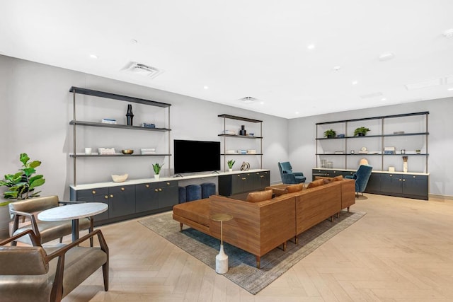 living room featuring light parquet floors