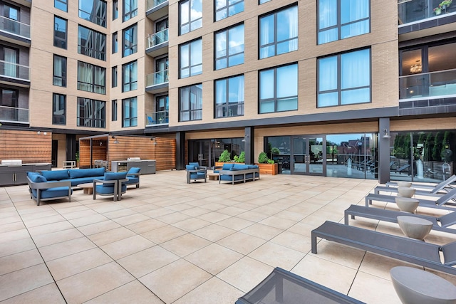 view of community featuring an outdoor hangout area