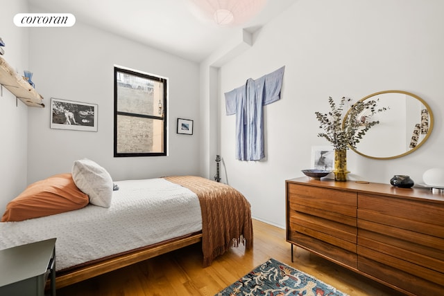 bedroom featuring hardwood / wood-style flooring