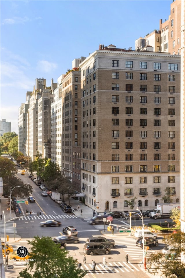 view of property with a city view