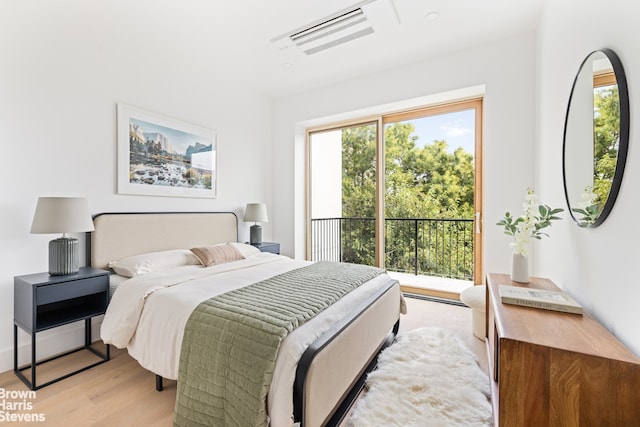 bedroom with light wood-type flooring