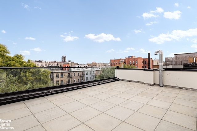 view of patio with a balcony