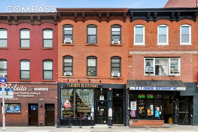 view of building exterior with cooling unit