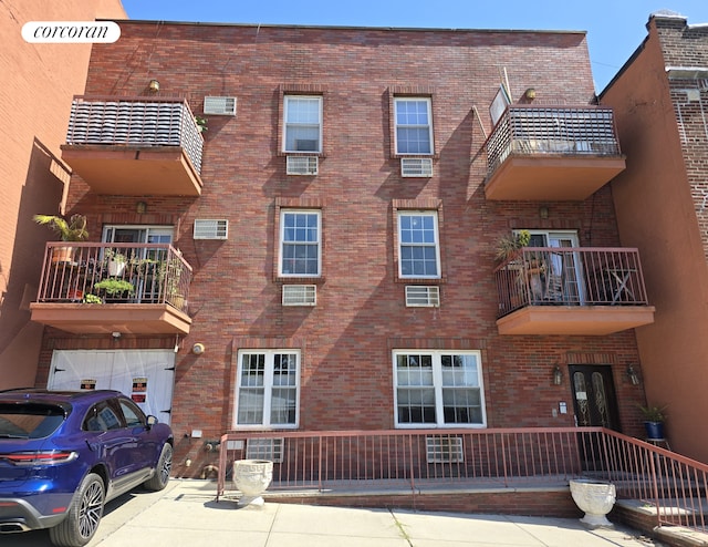 view of front of house featuring brick siding