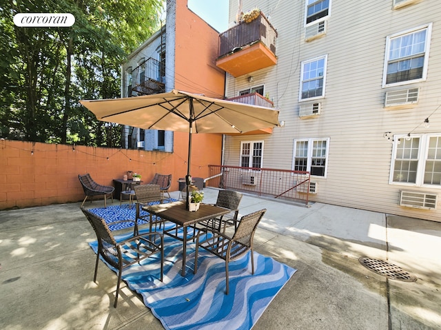 563 20th St, New York City, NY 11218 - view of patio / terrace with outdoor dining area and cooling unit
