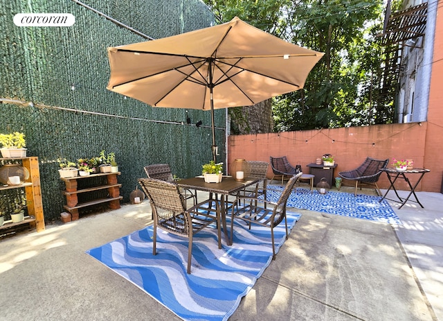 563 20th St, New York City, NY 11218 - view of patio with outdoor dining space