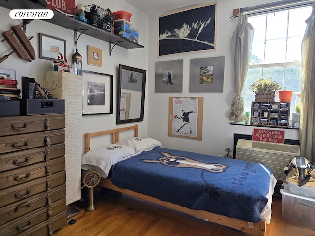 563 20th St, New York City, NY 11218 - bedroom with wood finished floors
