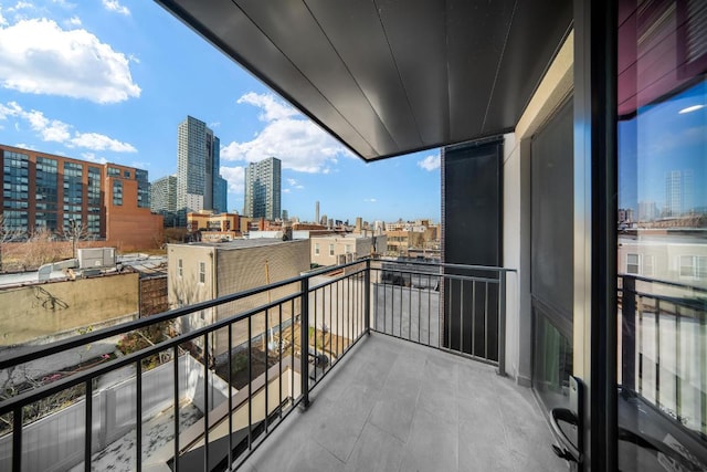 balcony featuring a view of city