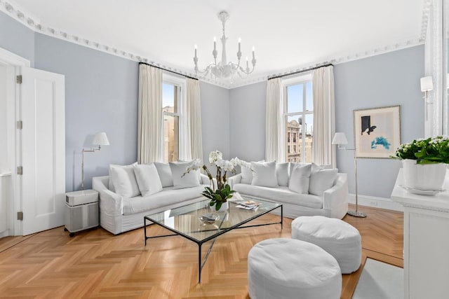 living room with light parquet flooring and a notable chandelier