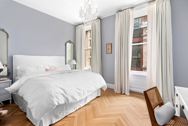 bedroom with multiple windows, crown molding, a notable chandelier, and baseboards