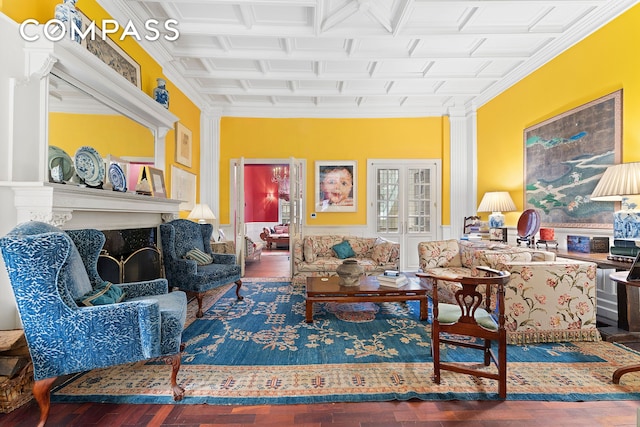 living area with ornamental molding, a fireplace, wainscoting, coffered ceiling, and hardwood / wood-style flooring