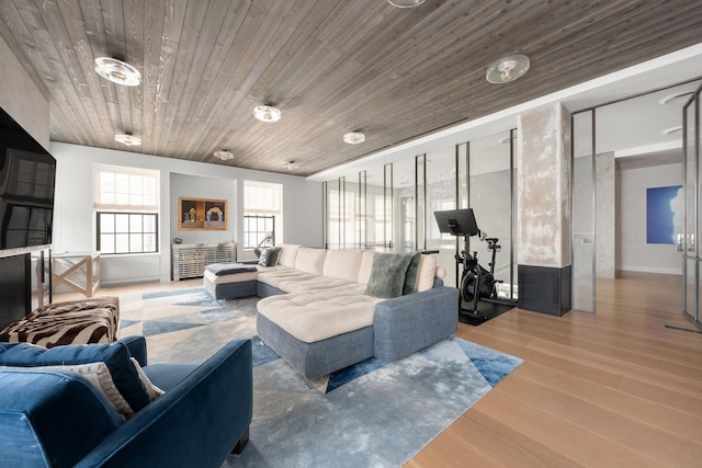 living room with wood finished floors and wooden ceiling