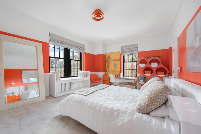 bedroom featuring crown molding and carpet floors