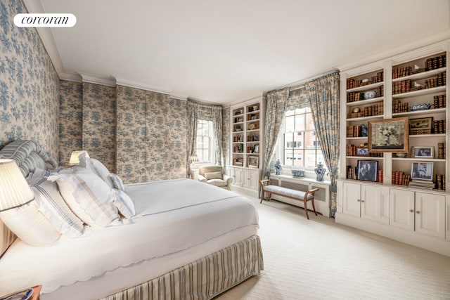 bedroom featuring light carpet and crown molding