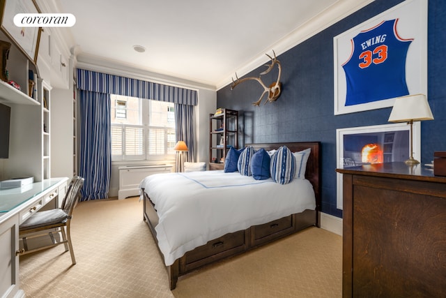 carpeted bedroom with ornamental molding