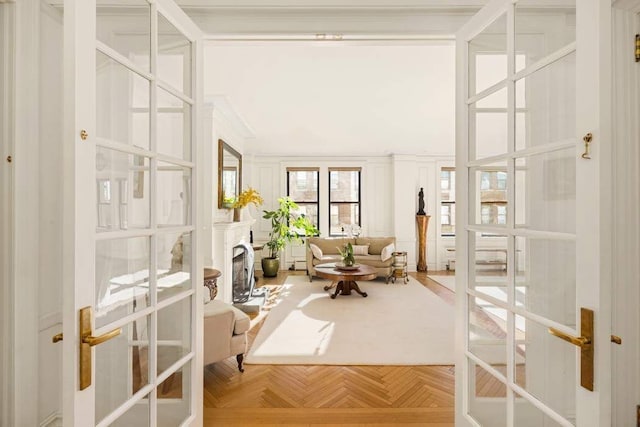 living area with french doors and parquet floors