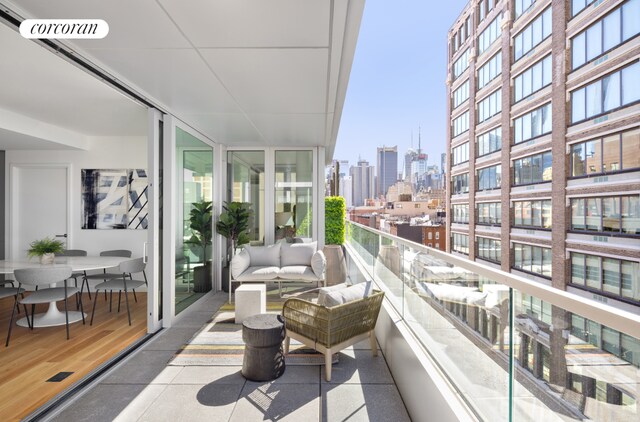 exterior space featuring a sunroom and a lawn