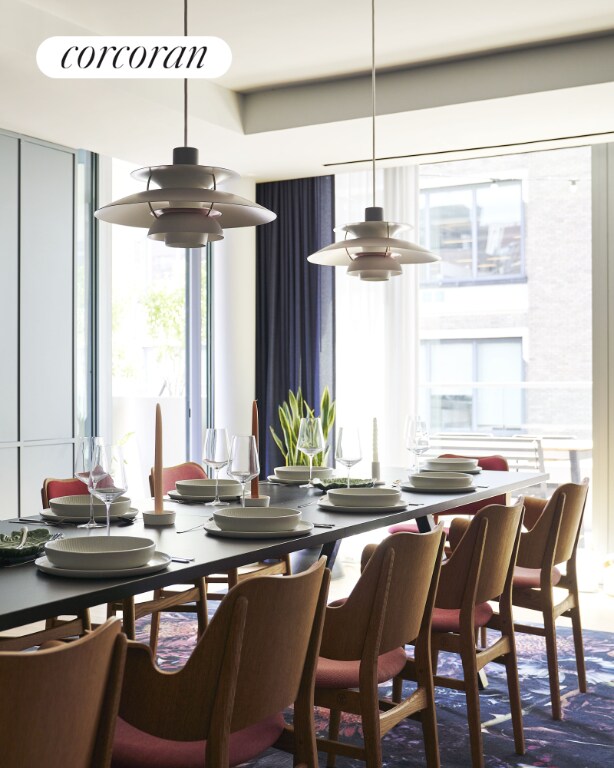 dining room with wood-type flooring