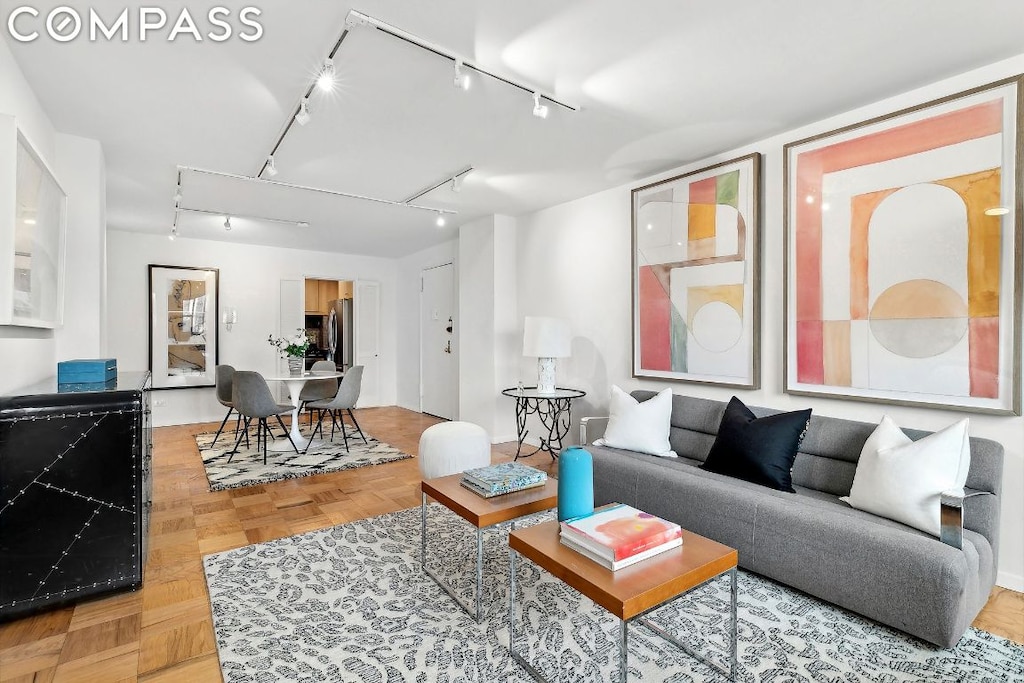 living room featuring light parquet floors