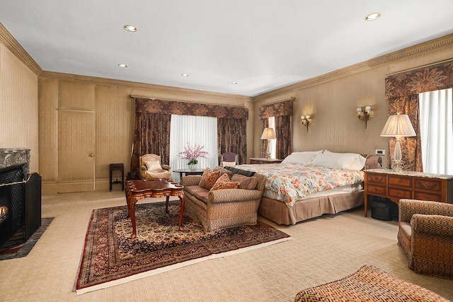 bedroom with ornamental molding, recessed lighting, and a fireplace with flush hearth