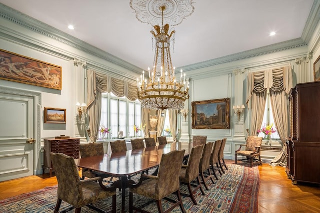 dining area with parquet flooring, plenty of natural light, and ornamental molding