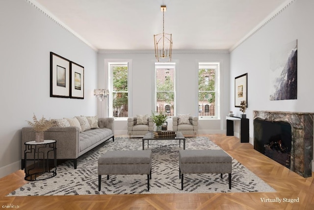 living room featuring a high end fireplace, ornamental molding, and light parquet flooring