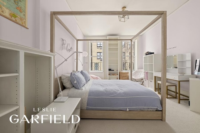 bedroom featuring carpet