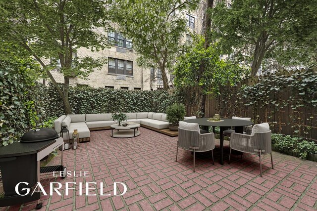 159 E 71st St, New York City, NY 10021 - view of patio with an outdoor living space, a fenced backyard, and a grill